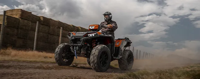 Rider driving an ATV